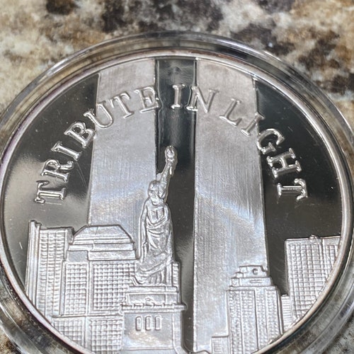 Rare shops limited edition coin Tribute to light 1troy ounce .999fine silver