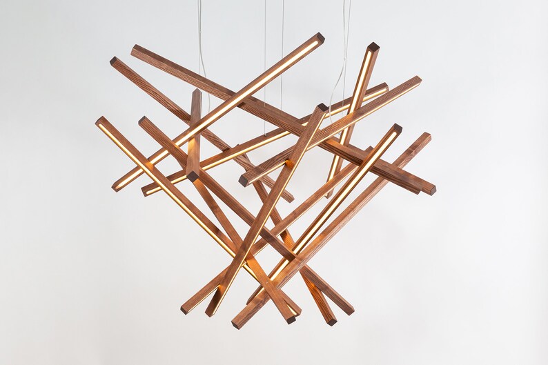 Underside view of the diamond maxi chandelier showing integrated LED lighting. Seamless blend of sculpture and illumination.
