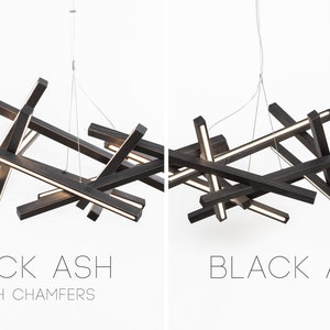 Handcrafted wooden industrial modern chandelier Infinity in 2 variants of black color and black with brown chamfers.