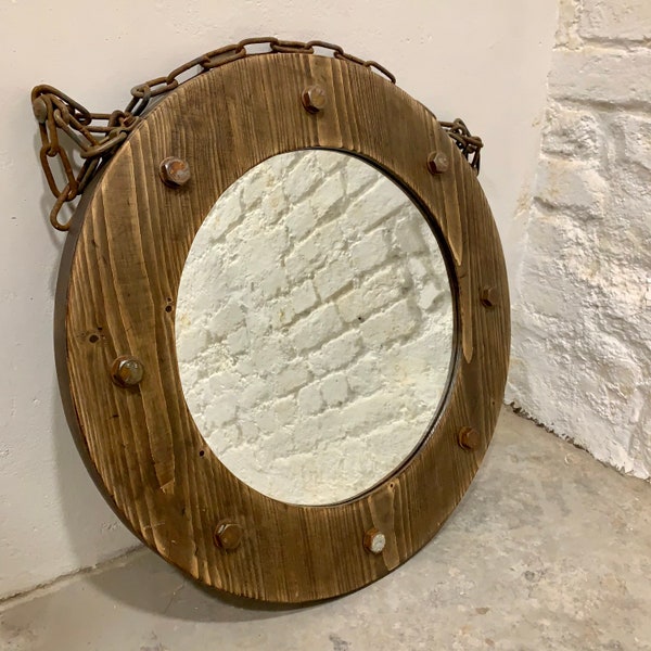 Industrial style round mirror.