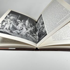May include: A black and white illustration of a group of people in a crowded scene. The illustration is from a book about the history of body art.