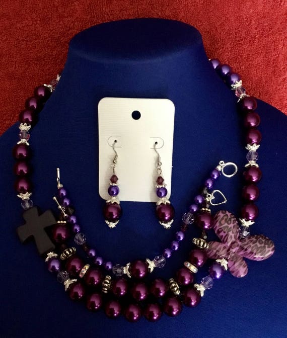 La’Faye Regal Designs by Dana Wine & Purple Butterfly and Purple Cross Necklace, 2 Bracelet and Earrings Set