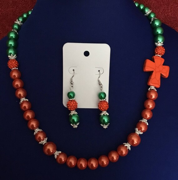 La’Faye Regal Designs by Dana Orange Cross Orange & Kelly Green Necklace and Earrings