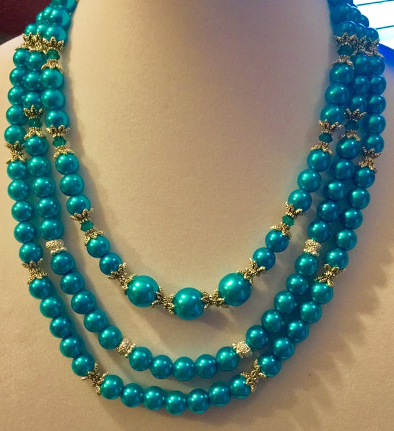 La'Faye Regal Designs by Dana 3 Strand Montana Blue Necklace, 3 Bracelets and Earrings Volume 2