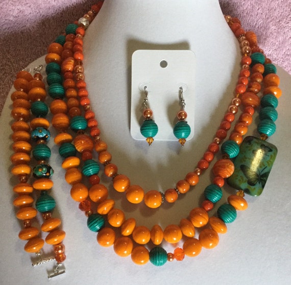 La'Faye Regal Designs by Dana Sizzling Summer Collection Orange & Butterfly 3 String Necklace,2 Bracelets and Earring Set
