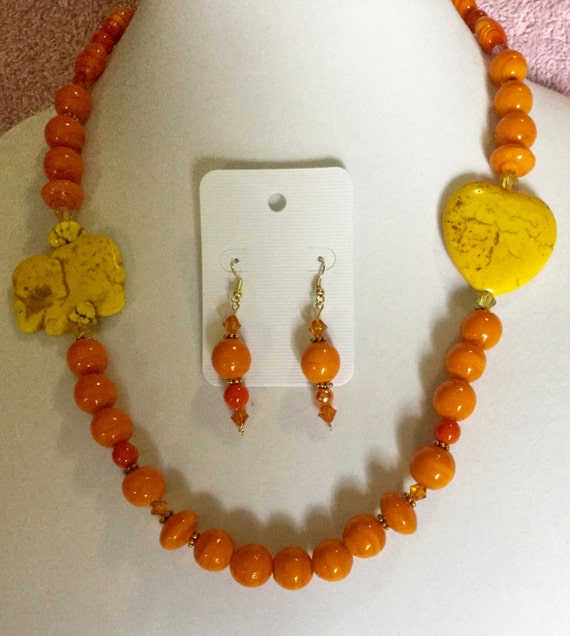 La'Faye Regal Designs by Dana Sizzling Summer Orange and Yellow Heart and Elephant Necklace, and Earrings Set