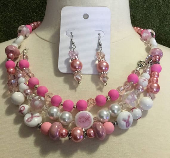 La’Faye Regal Designs by Dana, Breast Cancer (BCA) Necklace, 2 Bracelets and Earrings Set