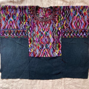 Embroidered huipil traditional poncho top blouse, hand embroidered by female Guatemalan artisan