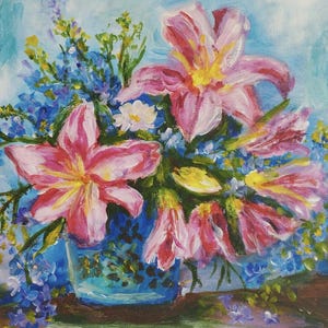 May include: Oil painting depicting a floral arrangement. Pink lilies with yellow centres and blue forget-me-nots are arranged in a blue vase. The painting is set against a light blue background, with a wooden surface.