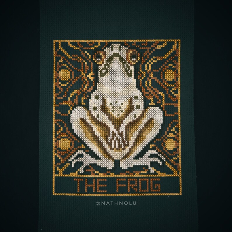 Modern cross stitch with a creepy dark aesthetic