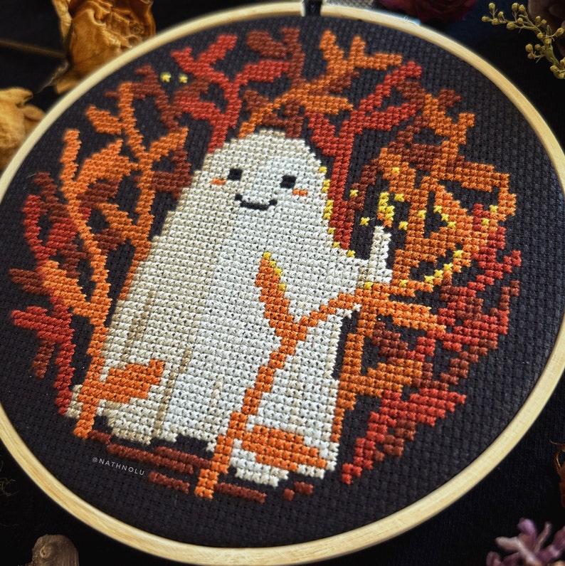 Spooky season stitching with a witchy and creepy watcher vibe