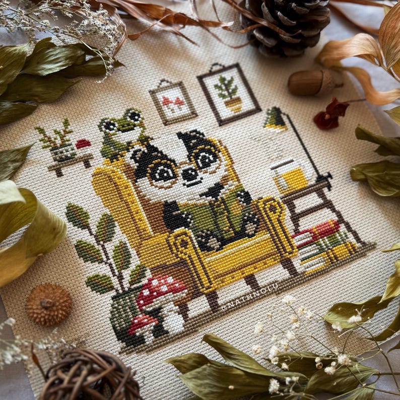 Whimsical woodland animal pattern showing a reading badger in a warm, rustic reading nook and a small frog companion.