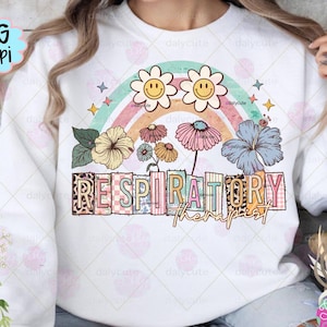 May include: White sweatshirt featuring a colorful floral and rainbow design. The design includes smiling daisy flowers, a rainbow, and the words "RESPIRATORY therapist" in a block letter style. The image also includes the text "PNG 300dpi".