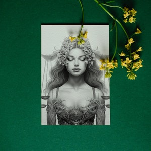 May include: A black and white illustration of a woman with a floral crown and scales. She is wearing a detailed, ornate outfit with a large, central design.