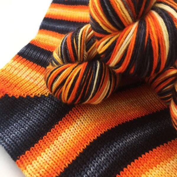 Hand dyed self striping merino sock yarn - Lavastream