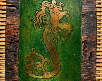 Mermaid floating acid etched in copper plate