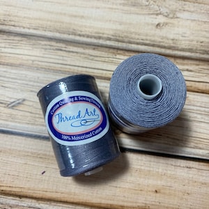 1 Spool Slate Gray Heavy Duty Cotton Quilting Thread 1000 M, 50 Wt. Threadart brand Mercerized 100% cotton thread. Quilting thread