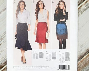 May include: A Burda Style sewing pattern for a skirt, featuring three skirt designs. The pattern includes sizes EUR 36-46 and US 10-20. The cover displays images of the skirt styles and includes text in multiple languages.