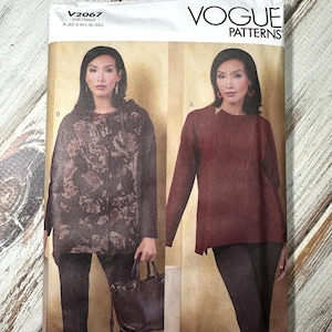 May include: Vogue Patterns sewing pattern V2067 featuring two women modeling different tops. The pattern includes sizes XS-XXL. The cover has the Vogue Patterns logo and the designer's name, Marcy Tilton.