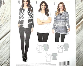 May include: A sewing pattern package featuring three garment designs: a jacket, a t-shirt, and a tunic. The package has the Burda Style logo and the number 6610. The designs are shown on the front of the package.