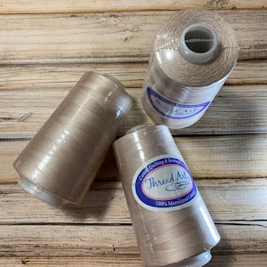 1 Spool Parchment tan Heavy Duty Cotton Quilting Thread 2500 M, 40 Wt. Threadart brand. Mercerized 100% cotton thread. Quilting thread.
