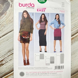 May include: A Burda Young sewing pattern for skirts, featuring three skirt styles. The pattern includes images of the finished skirts and the text "super easy". The pattern is labeled with the number 6598 and includes size information.