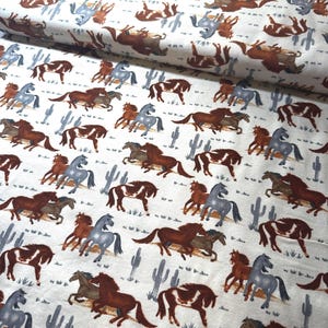 Multi Horses in the Desert on cream Super Snuggle Flannel Fabric. Joann Fabrics 100% cotton Brushed for softness Rare OOP pony desert cactus