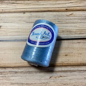 1 Spool Light blue Heavy Duty Cotton Quilting Thread 1000 M, 50 Wt. Threadart brand. Mercerized 100% cotton thread. Quilting thread.