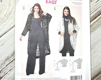 May include: A Burda Style sewing pattern packet, featuring two women modeling jackets and jumpsuits. The packet is white with the number 6588 in yellow. Text includes "Super Easy" and size information.