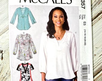 Women’s Shirt Sizes 14-22. Loose Top blouse pullover, short long sleeves side slits. Paper Sewing Pattern McCalls Misses. New Uncut 7357