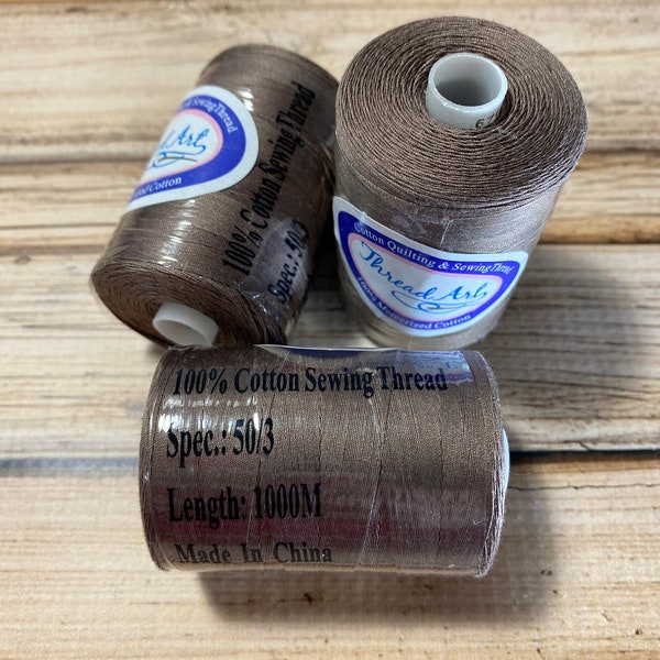 1 Spool Taupe Mushroom Heavy Duty Cotton Quilting Thread 1000 M, 50 Wt. Threadart brand. Mercerized 100% cotton thread. Quilting thread.