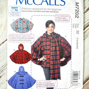 May include: McCall's sewing pattern for beginner capes. The pattern features three cape designs: a geometric print, a red and black houndstooth, and a blue cape with toggle closures. The pattern includes instructions and basic sewing tips.