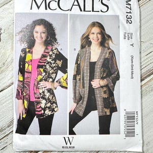 May include: McCall's M7132 sewing pattern featuring two jacket designs. The pattern envelope shows women wearing the jackets, one with a floral print and the other with a geometric pattern. Includes size Y (Xsm-Sml-Med).