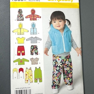 NB-18 m Tutina, giacca, top, gilet, pantaloni e cappello per neonati. Maglietta per bambini e bambine XXS-L. Cartamodello Simplicity. Nuovo, non tagliato. 1556