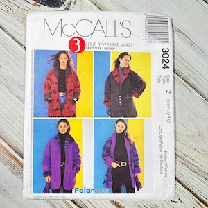 May include: A McCall's sewing pattern for a reversible jacket. The pattern features four images of the jacket in different colors and styles. The pattern includes the text "3 HOUR REVERSIBLE JACKET" and "PolarGEAR".