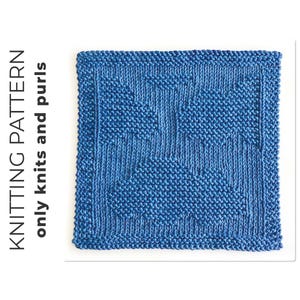 Peut inclure: Une tasse en céramique blanche avec une anse noire et le texte "But First, Coffee" en noir, dans une police manuscrite. La tasse est posée sur une surface blanche.