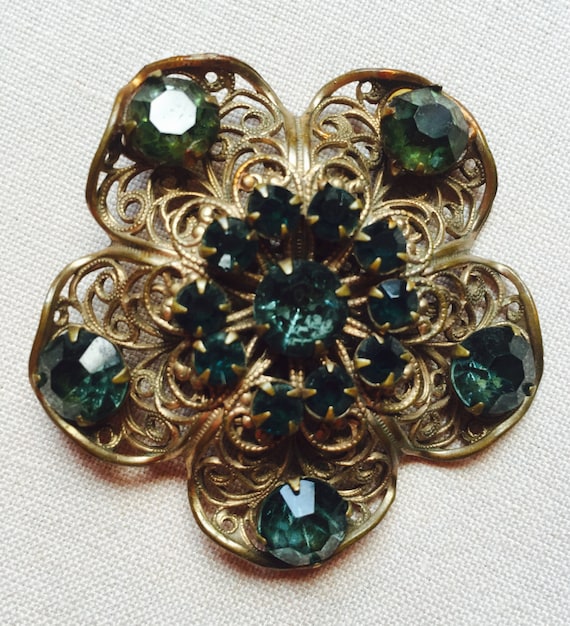 Vintage Filigree Brooch with Green Rhinestones / … - image 1