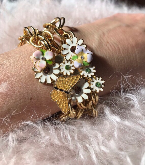 Bracelet circa 1920 à décor de fleurs de lotus en platine et diamants 178