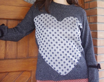 Gray wool sweater with a giant shiny heart pattern