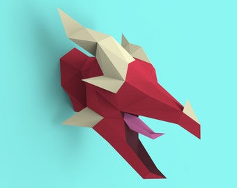May include: A red and cream origami dragon head with a pink tongue sticking out. The dragon head is made of paper and has a 3D effect.