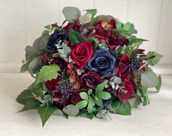 Red, burgundy and navy blue artificial wedding flowers.