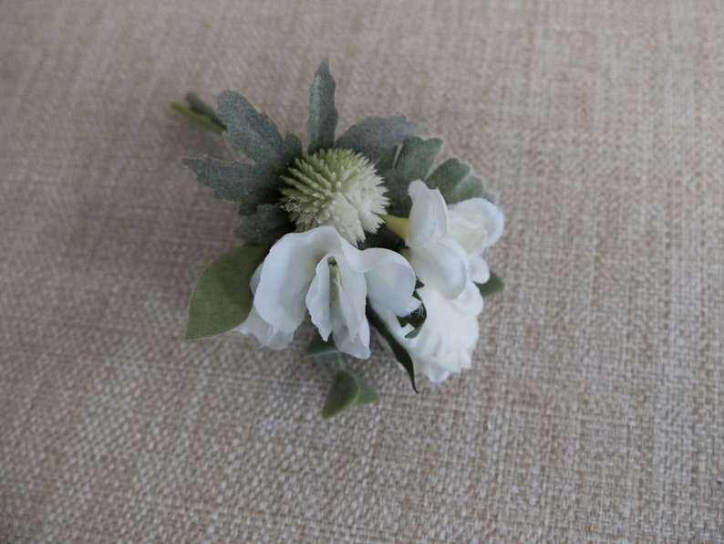 White and green silk wedding buttonhole boutonniere.