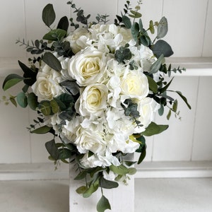 Bride teardrop bouquet. Roses, hydrangea and eucalyptus silk wedding flowers.