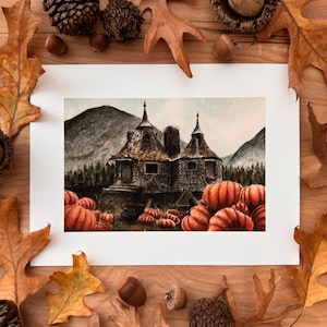 May include: A watercolor painting of a stone cottage with a thatched roof, surrounded by a field of pumpkins. The cottage has two chimneys and two towers. The background is a misty mountain landscape.