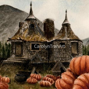 May include: A watercolor painting of a stone cottage with two conical roofs nestled in a forest with mountains in the background. A large patch of orange pumpkins sits in the foreground. The text CarolynTranArt is visible on the cottage.