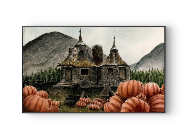 May include: A watercolor painting of a stone cottage with two pointed roofs, situated in front of a forest and mountains. The foreground features a large collection of orange pumpkins and a black cauldron, all rendered in muted, earthy tones.