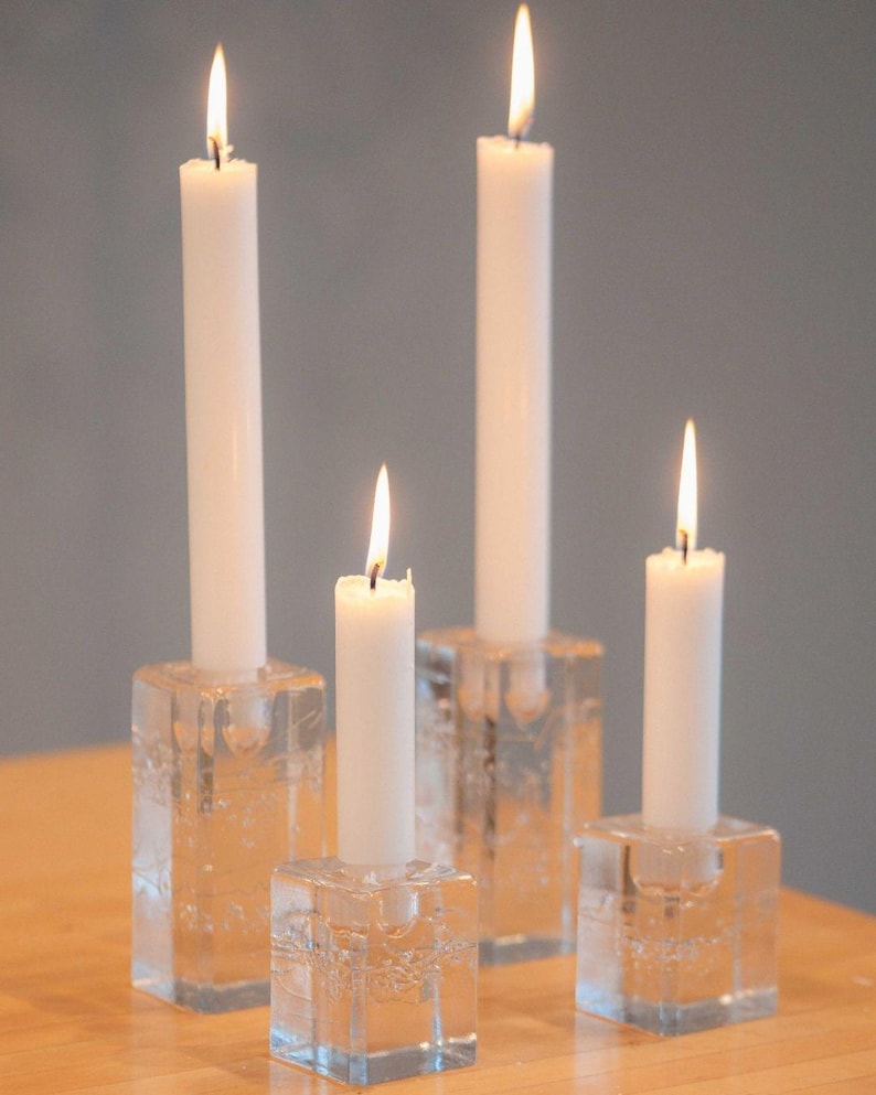 détail flamme bougie blanche paraffine ambiance lumineuse