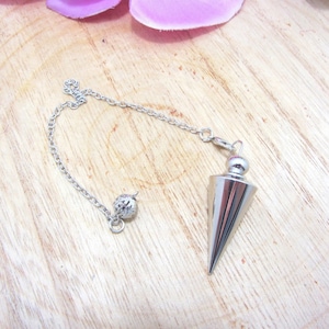 Metal divinatory pendulum