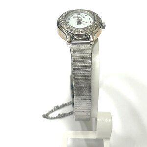 Ladies vintage 18K white gold Geneve oval shaped quartz movement watch set with round diamonds and mesh type stainless steel band. image 2