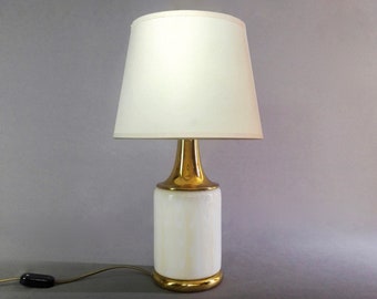1960s Fabbian Murano art glass and brass two-light table lamp.